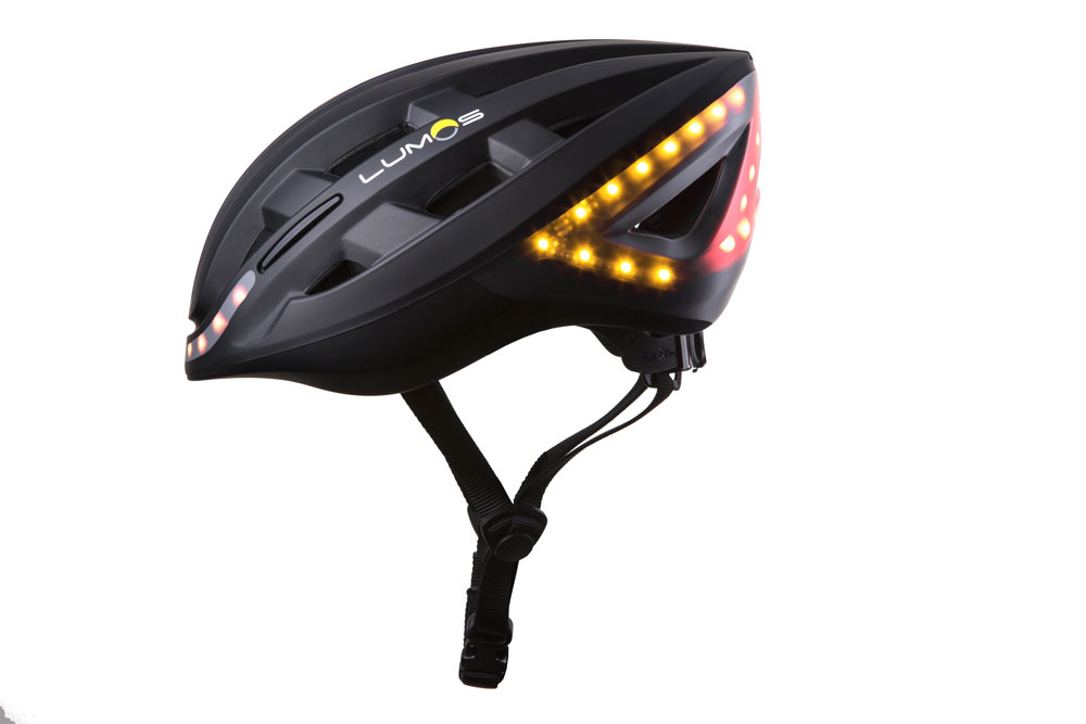 Black Lumos Kickstart bike helmet profile with rare lights on Black Lumos Kickstart bike helmet profile with rare lights on