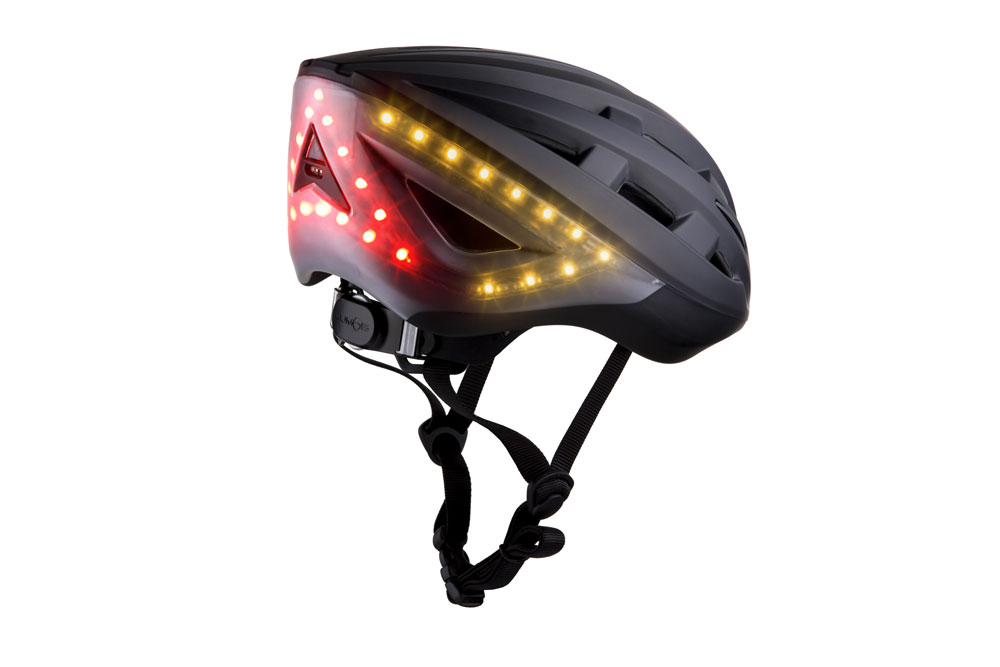 Black Lumos Kickstart bike helmet profile with rare lights on Black Lumos Kickstart bike helmet profile with rare lights on